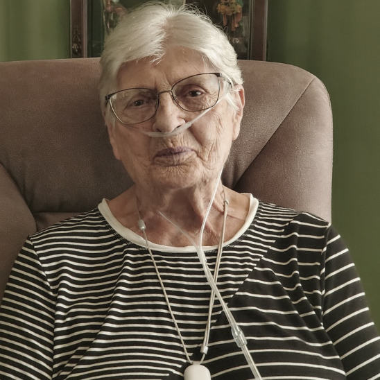 Senior Woman smiling wearing nasal cannula