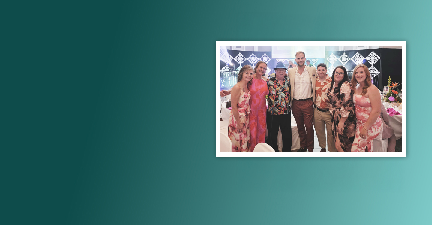 photograph of Charles at a gala with ProResp care team
