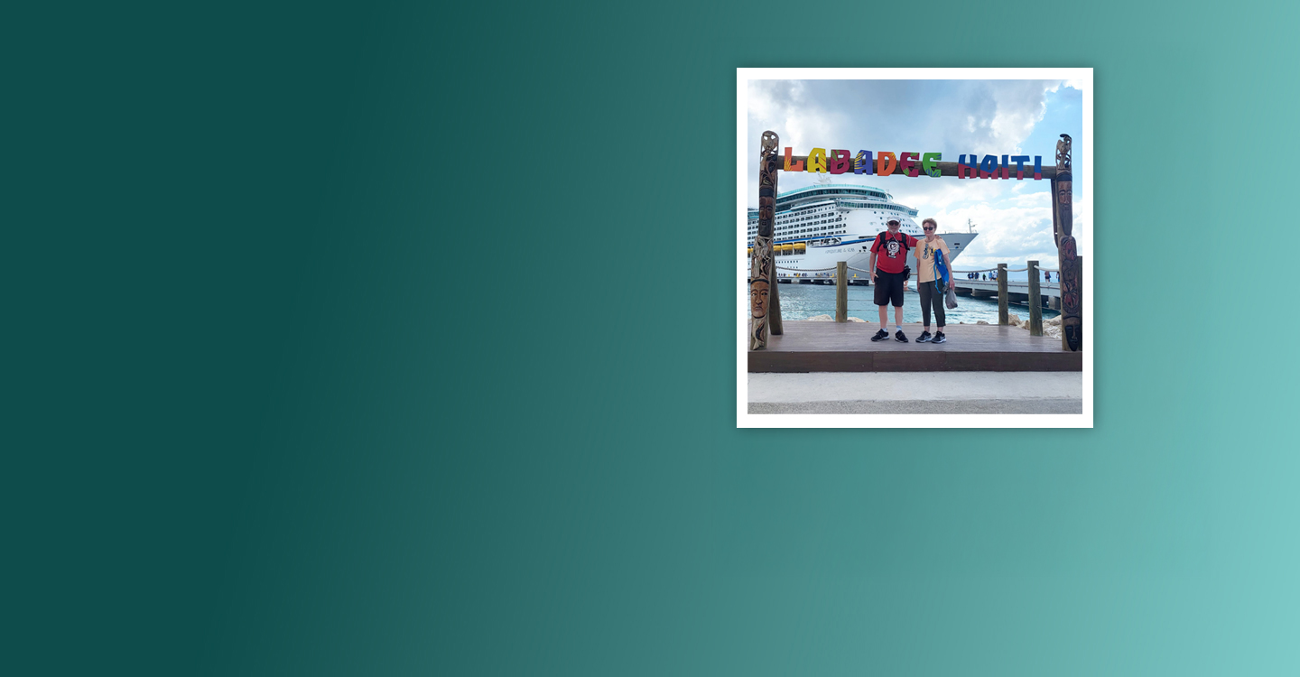 picture of a couple out front of a cruise ship