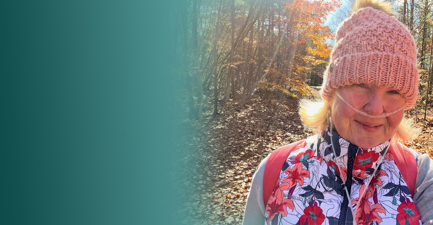 Monica in the park on a hike wearing a nasal canula