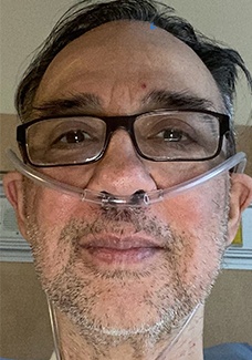 Man wearing nasal cannula