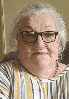 Senior woman wearing oxygen